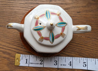Small Ceramic Teapot With Wood Base